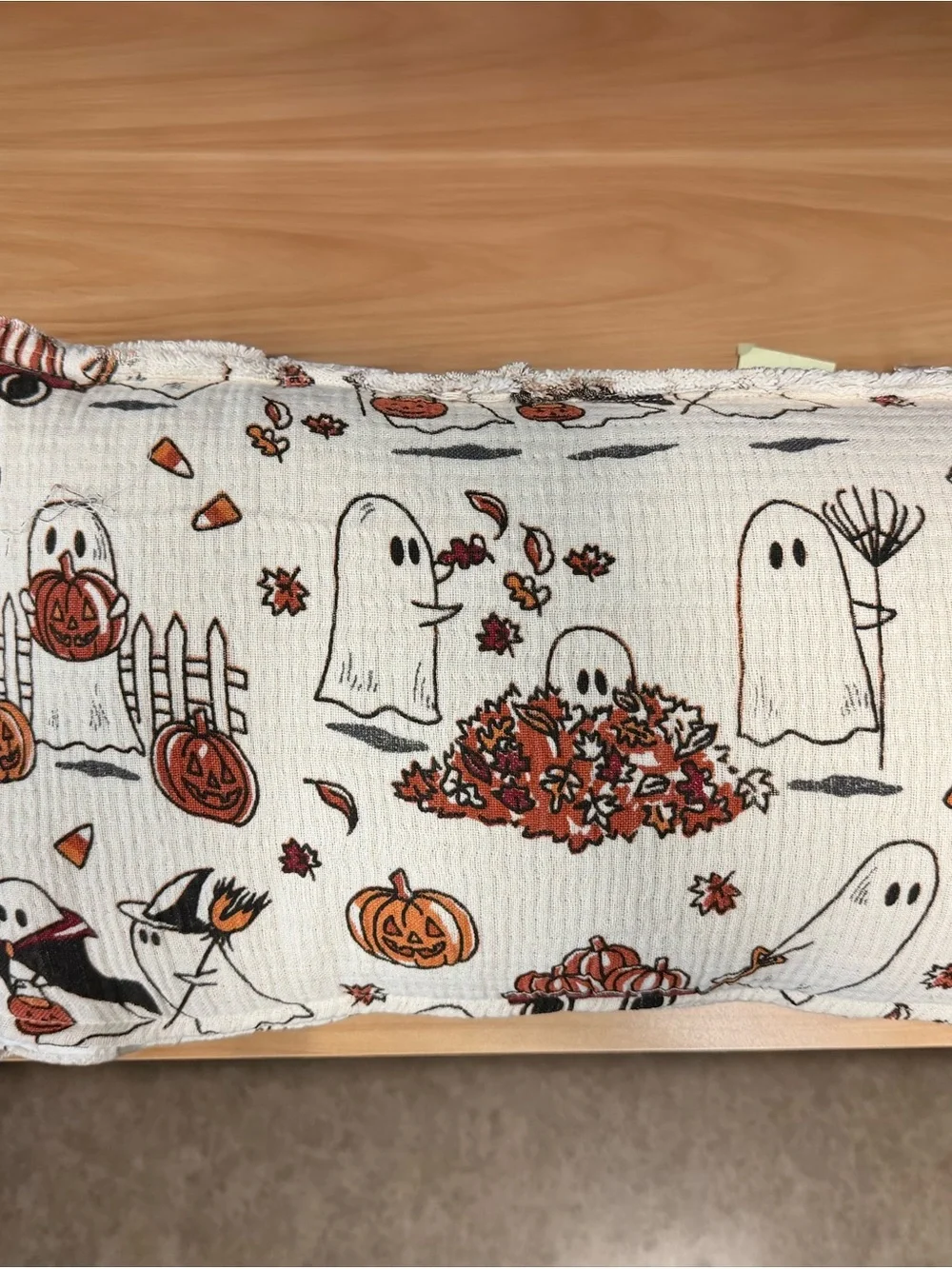 Isaac Mizrahi ghost in leaves halloween pillow